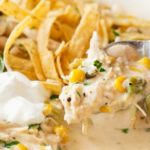 Slow Cooker Creamy White Chicken Chili | This creamy white chicken chili is made easy in the slow cooker, and has just the right amount of spice to warm up your night! | http://thechunkychef.com