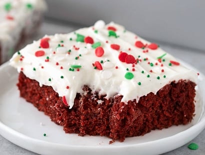 Red Velvet Brownies with Marshmallow Cream Cheese Frosting | Flavorful and festive red velvet brownies slathered in an ultra creamy frosting. Perfect for all holiday festivities, and easy to customize to other holidays as well! | http://thechunkychef.com