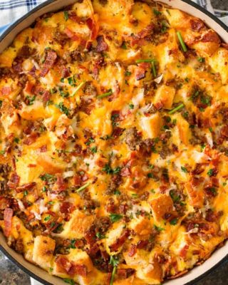 This make ahead breakfast casserole is a true family favorite! Perfect for a holiday breakfast, or anytime, it's loaded with bold flavors and is a cinch to make! #breakfastcasserole #breakfastrecipe #holiday #christmas #easter #mothersday #fathersday #breakfastbake
