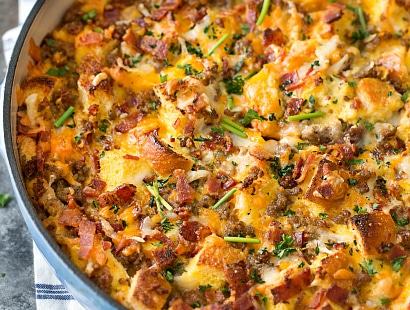 Overnight Breakfast Strata | This breakfast strata dish is made the night before, refrigerated overnight, then baked to bubbly, cheesy perfection! | http://thechunkychef.com