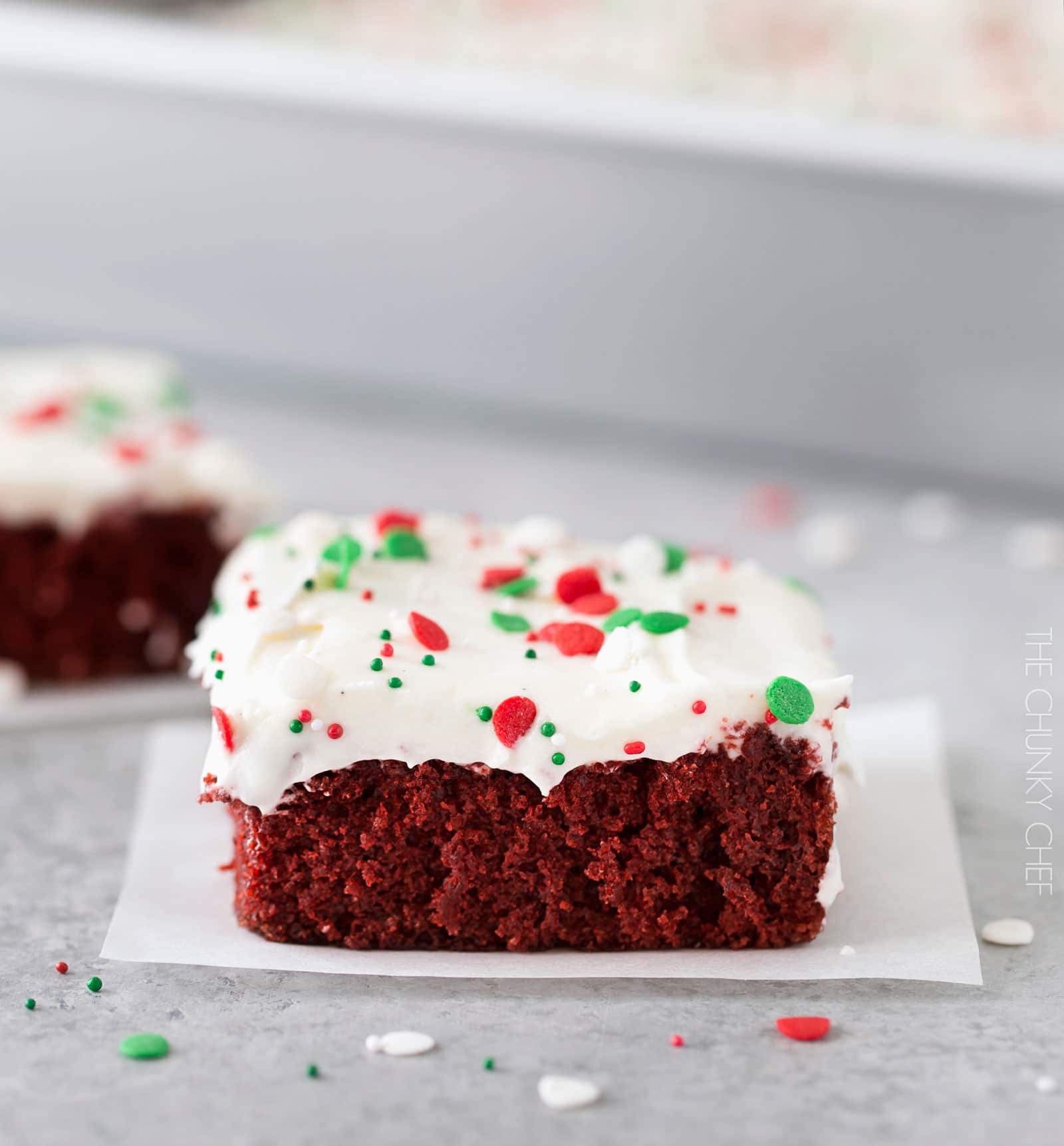 Red Velvet Brownies with Marshmallow Cream Cheese Frosting | Flavorful and festive red velvet brownies slathered in an ultra creamy frosting. Perfect for all holiday festivities, and easy to customize to other holidays as well! | http://thechunkychef.com