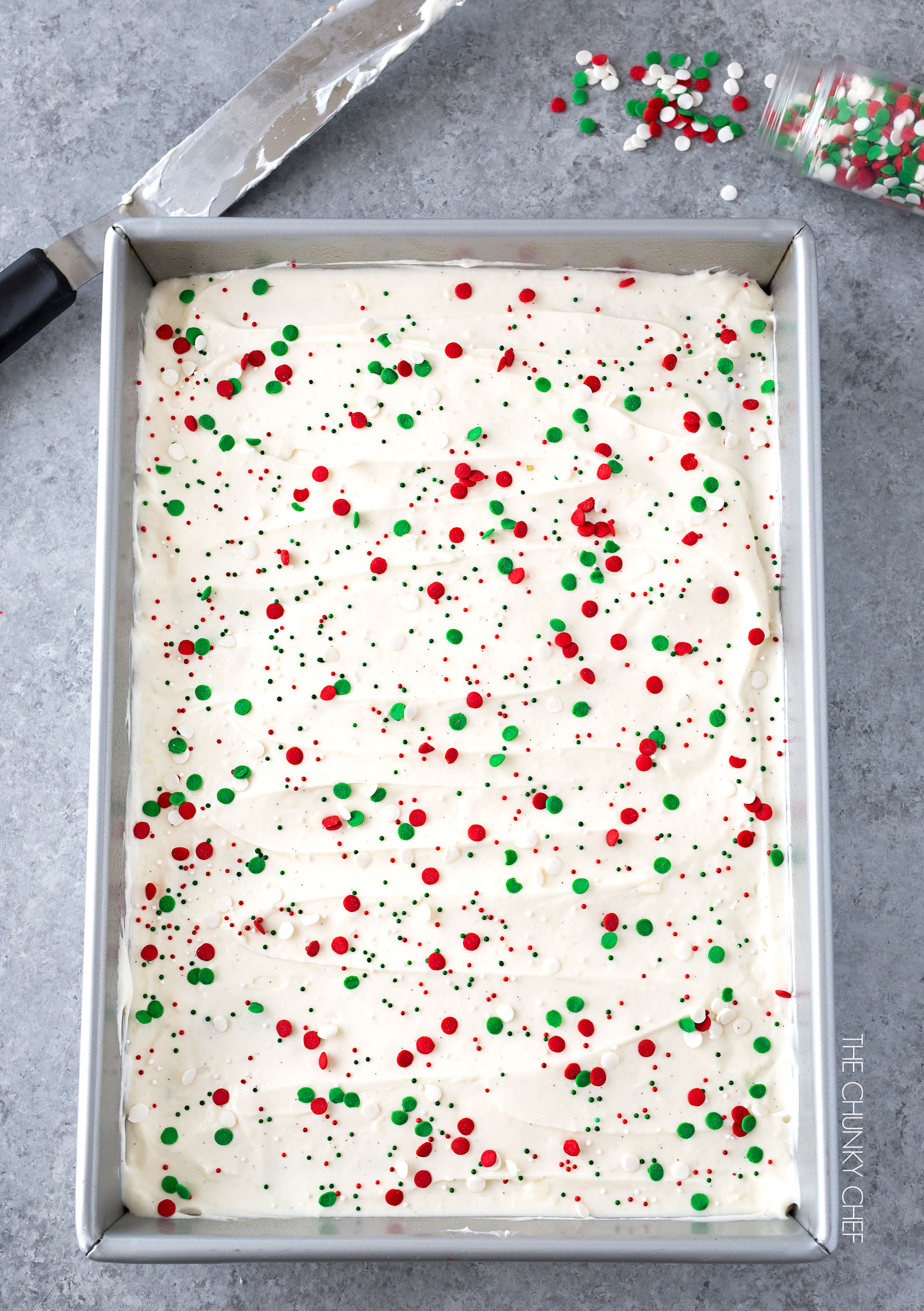 Red Velvet Brownies with Marshmallow Cream Cheese Frosting | Flavorful and festive red velvet brownies slathered in an ultra creamy frosting. Perfect for all holiday festivities, and easy to customize to other holidays as well! | http://thechunkychef.com