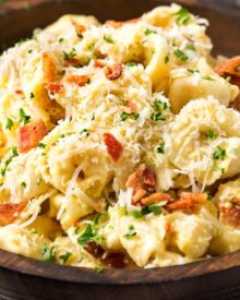 20 Minute Tortellini Pasta Carbonara | Cheese tortellini pasta is coated in a rich carbonara sauce, sprinkled with bacon and Parmesan cheese. It's the perfect weeknight dinner! | http://thechunkychef.com