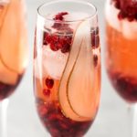 Pear Pomegranate Bellini | A delightful combination of Prosecco and pear brandy create this light, bubbly, and elegant Bellini! As pretty as it is delicious, it's just the drink you need for your next party or date night! | http://thechunkychef.com