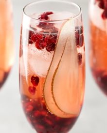 Pear Pomegranate Bellini | A delightful combination of Prosecco and pear brandy create this light, bubbly, and elegant Bellini! As pretty as it is delicious, it's just the drink you need for your next party or date night! | http://thechunkychef.com