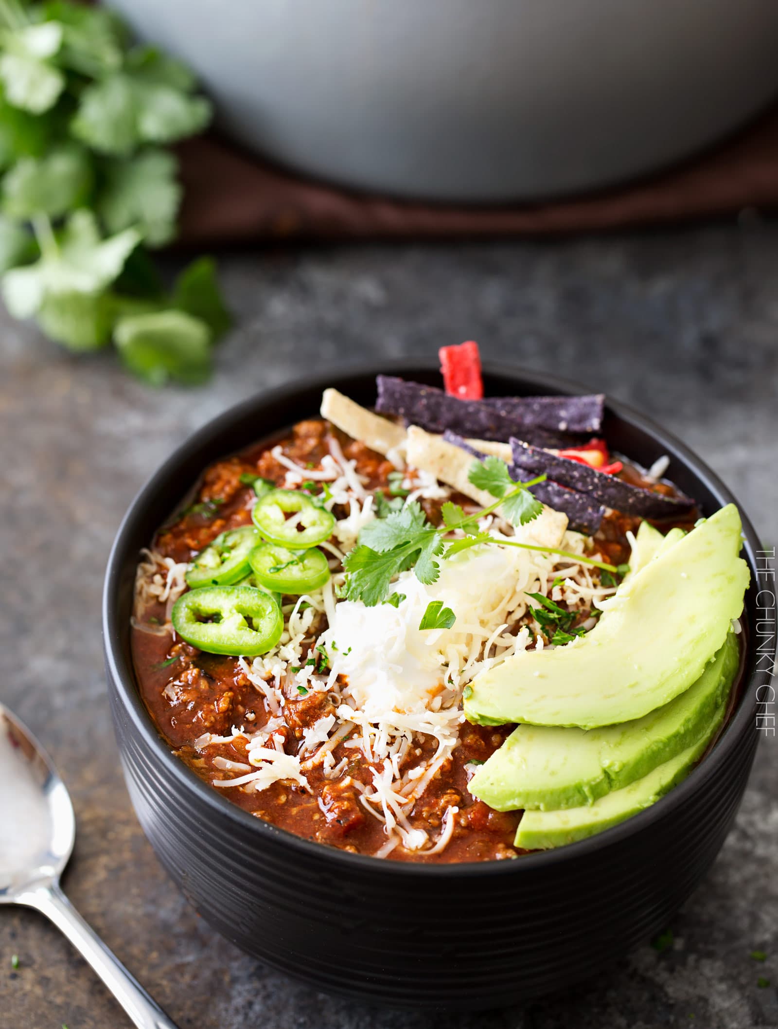 Smoky Beef and Poblano Chili | A hearty beef and poblano pepper chili with just the right amount of heat and spice and full of great smoky flavor! Perfect for a game day meal! | http://thechunkychef.com