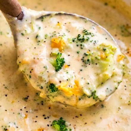 This copycat Broccoli Cheddar Soup is SO hearty and rich, and made in just one pot on your stovetop!  Crockpot and Instant Pot directions too! #soup #copycatrecipe #broccolicheddar #broccolicheese #creamy #panera #souprecipe #comfortfood