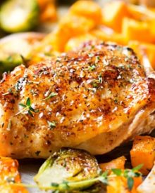 Sheet Pan Maple Mustard Roasted Chicken | Chicken thighs are coated in a sweet and savory maple mustard sauce and roasted alongside creamy butternut squash and savory brussels sprouts, all on one sheet pan for an incredibly quick, easy meal with hardly any cleanup needed! | http://thechunkychef.com