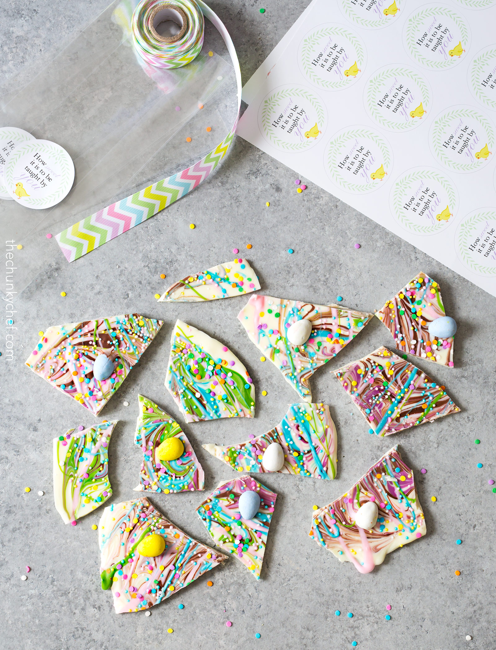 Brownie Batter White Chocolate Bark | A fun no bake bark dessert, made with white chocolate swirled together with milk chocolate brownie batter, and decorated in fun Spring colors! Easily customizable to any holiday and makes a great homemade gift! | http://thechunkychef.com