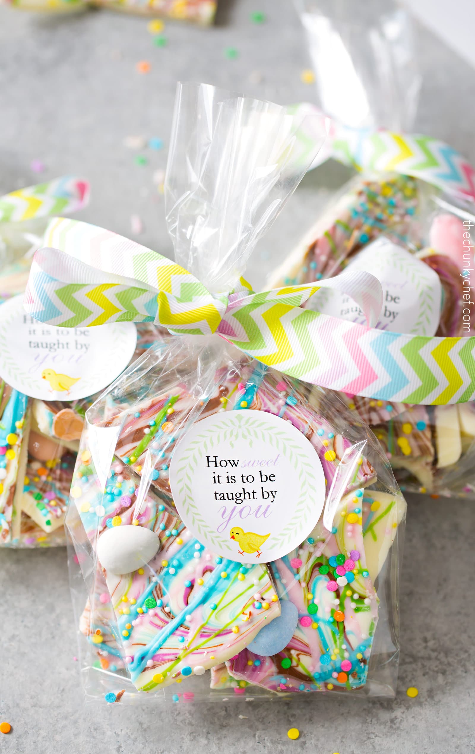 Brownie Batter White Chocolate Bark | A fun no bake bark dessert, made with white chocolate swirled together with milk chocolate brownie batter, and decorated in fun Spring colors! Easily customizable to any holiday and makes a great homemade gift! | http://thechunkychef.com