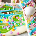 Brownie Batter White Chocolate Bark | A fun no bake bark dessert, made with white chocolate swirled together with milk chocolate brownie batter, and decorated in fun Spring colors! Easily customizable to any holiday and makes a great homemade gift! | http://thechunkychef.com