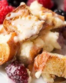 Mixed Berry Overnight Croissant Breakfast Bake | Whip this croissant breakfast bake up the night before, let it sit overnight, then bake it to crispy yet creamy perfection. Drizzle it with vanilla bean glaze and prepare to fall in love! | http://thechunkychef.com