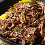 Slow Cooker Shredded Italian Beef | Tangy and spicy, this Italian beef is easily cooked in a slow cooker until fork tender, then shredded, for the ultimate in delicious easy weeknight dinners! | http://thechunkychef.com