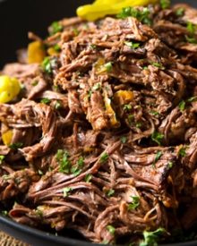 Slow Cooker Shredded Italian Beef | Tangy and spicy, this Italian beef is easily cooked in a slow cooker until fork tender, then shredded, for the ultimate in delicious easy weeknight dinners! | http://thechunkychef.com