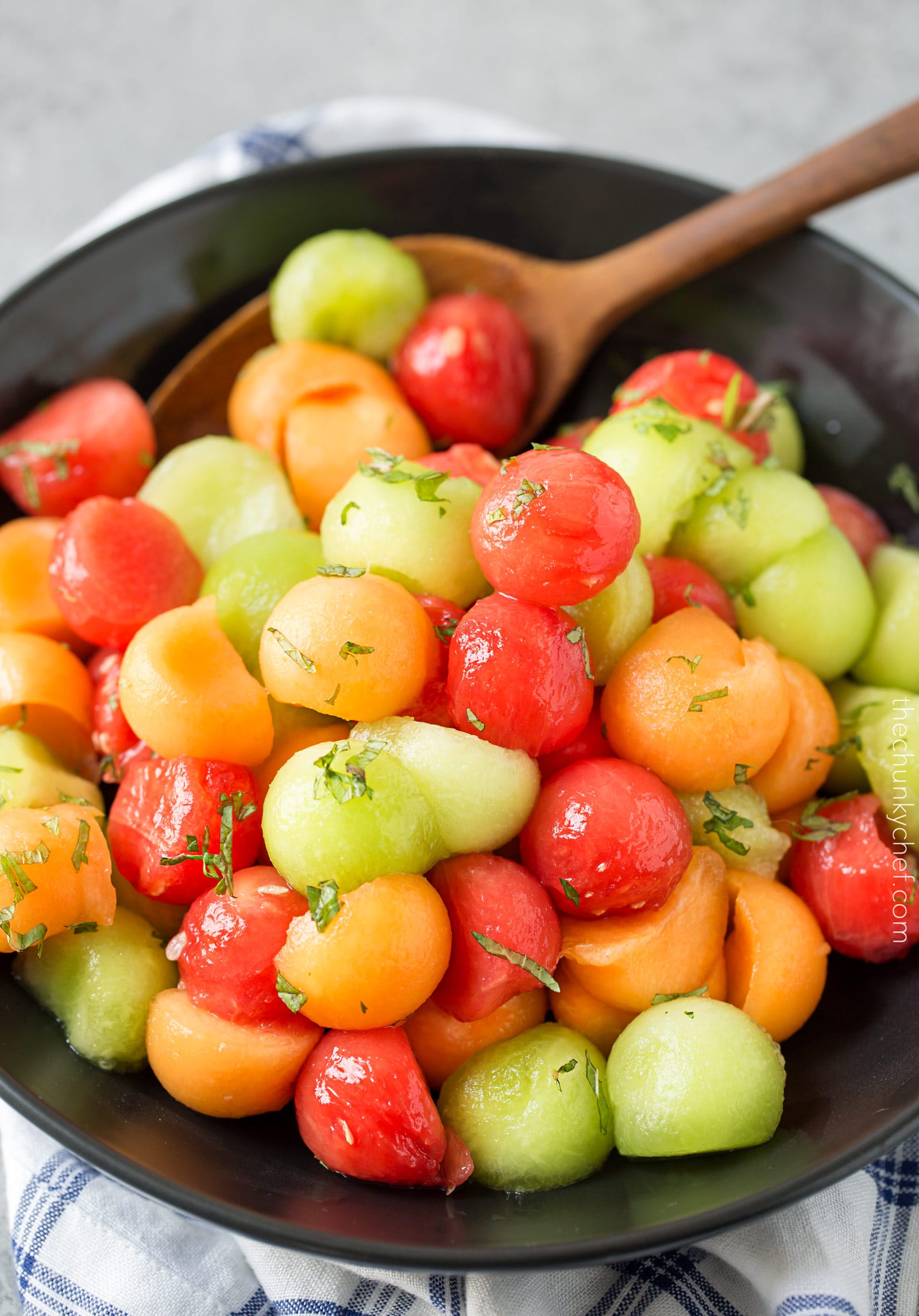 Summer Fruit Salad with Serrano Mint Syrup | A refreshing fruit salad made with a variety of summer fruits, tossed in an easy simple syrup made with mint and serrano pepper! | http://thechunkychef.com