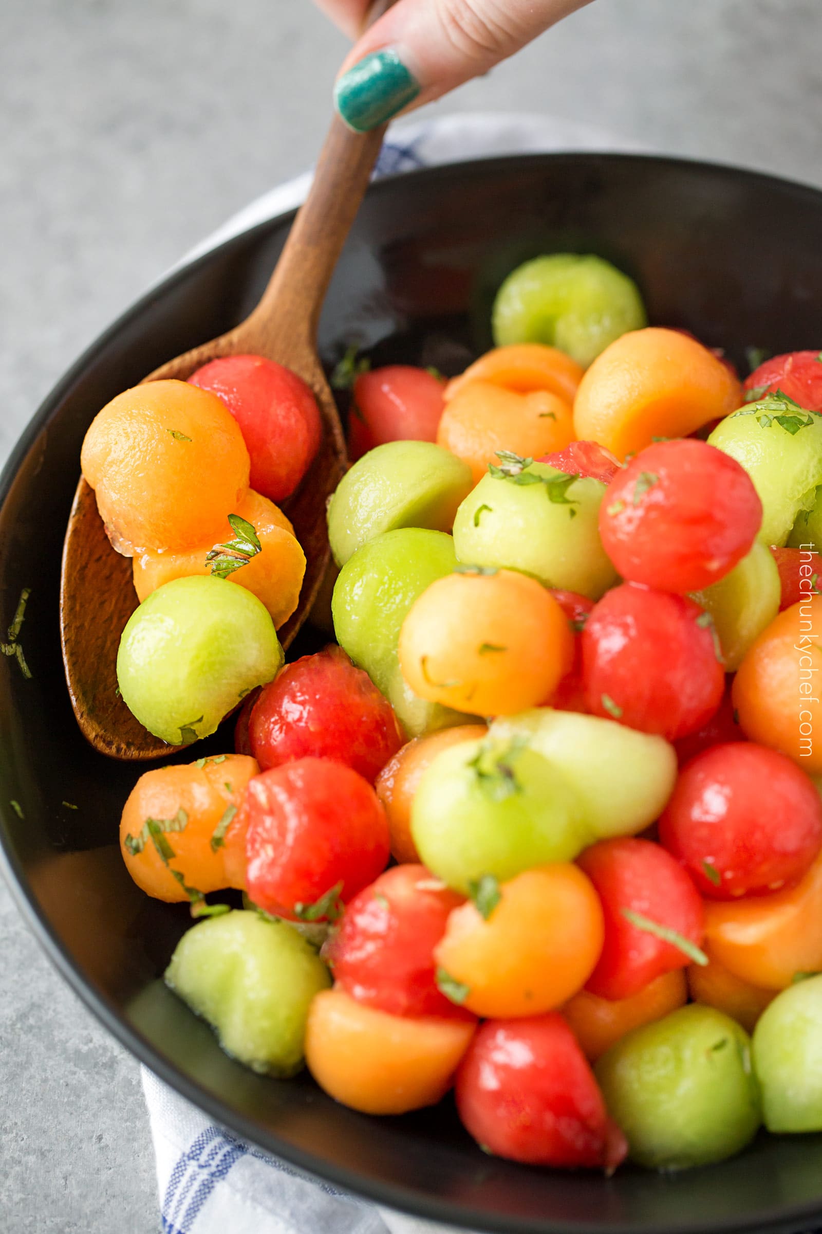 Summer Fruit Salad with Serrano Mint Syrup | A refreshing fruit salad made with a variety of summer fruits, tossed in an easy simple syrup made with mint and serrano pepper! | http://thechunkychef.com