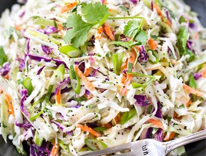 Tequila Lime Coleslaw with Cilantro | This unique coleslaw recipe combines great Mexican flavors like tequila, lime and cilantro, for a truly crowd-pleasing side dish! | http://thechunkychef.com