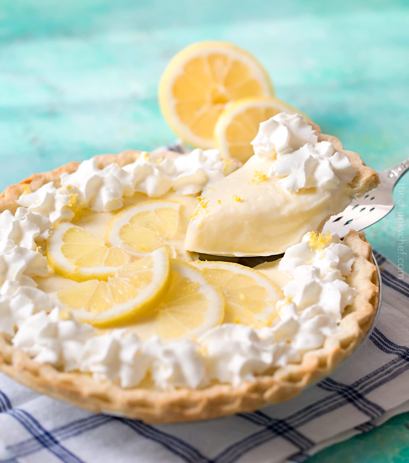 Creamy Sour Cream Lemon Pie | This almost no bake pie is cool, creamy, rich, and bursting with summer lemon flavors. The sour cream gives this dessert a delicious tang! | http://thechunkychef.com
