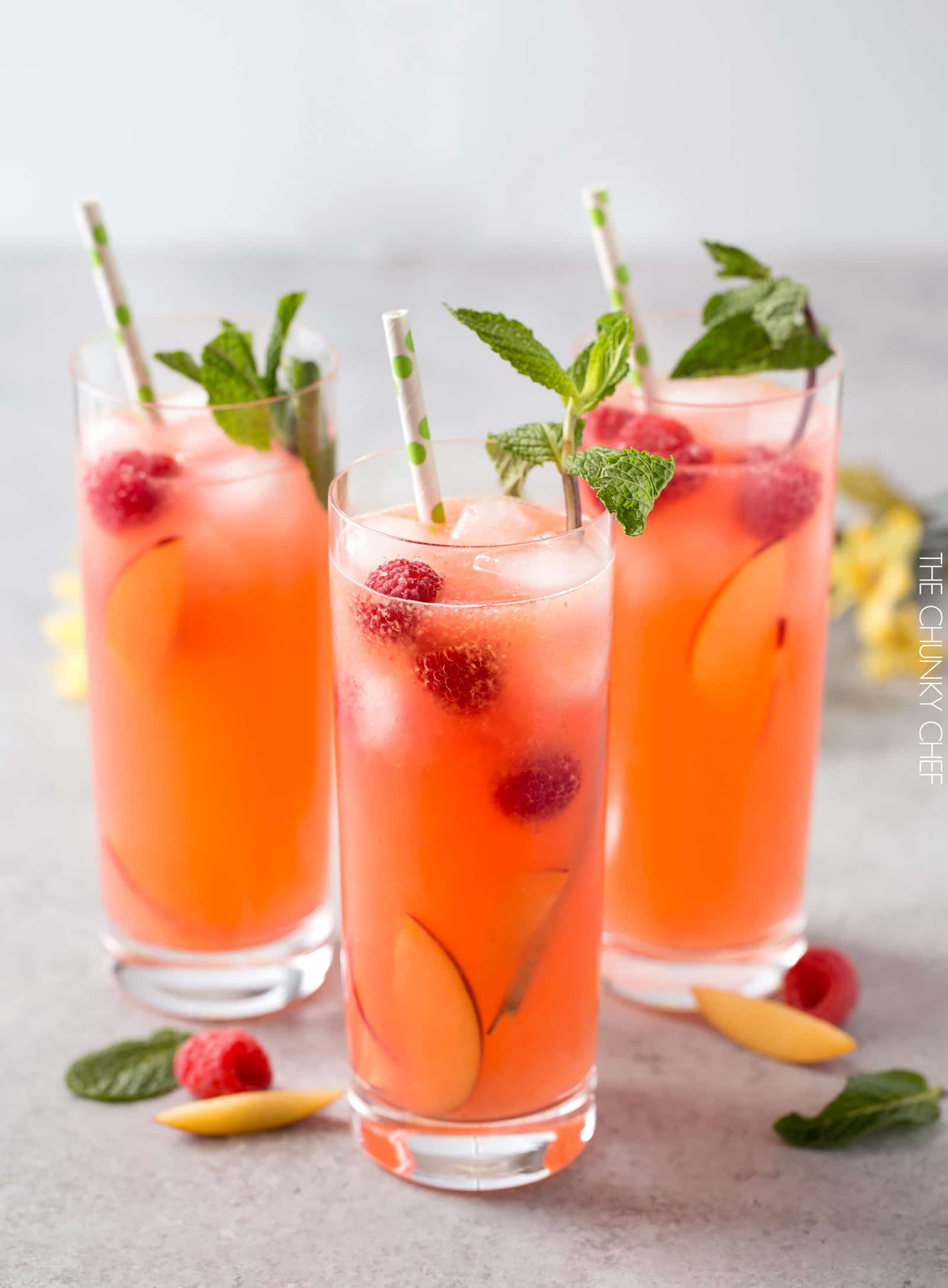 Homemade Raspberry Peach Lemonade | The perfect refreshing summer drink is here! Full of raspberry and peach flavors, this homemade lemonade is like drinking sunshine! | http://thechunkychef.com