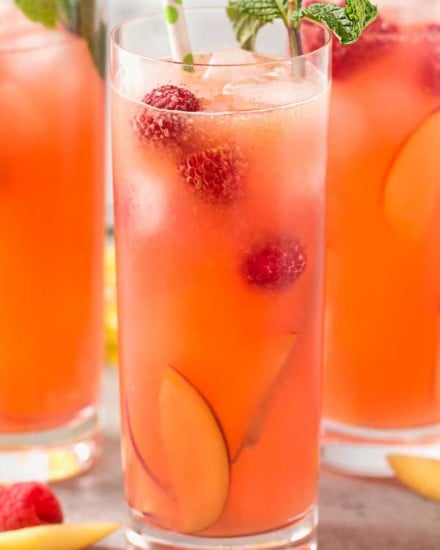 Homemade Raspberry Peach Lemonade | The perfect refreshing summer drink is here! Full of raspberry and peach flavors, this homemade lemonade is like drinking sunshine! | http://thechunkychef.com