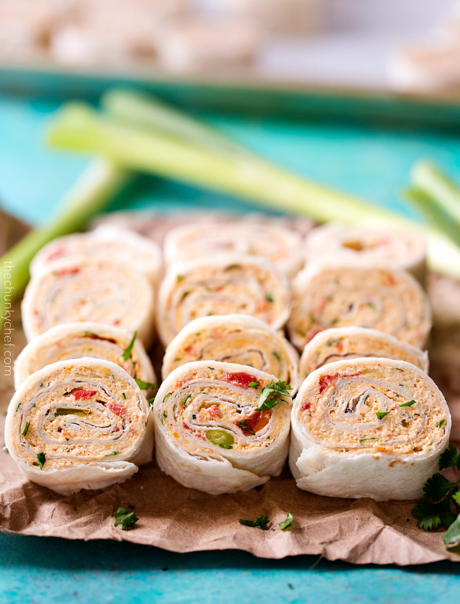 Chicken Taco Mexican Pinwheels | These pinwheels are filled with a creamy chicken taco filling, which is easily customizable, and rolled up to make a perfect appetizer or party food! | http://thechunkychef.com