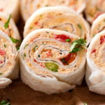 Chicken Taco Mexican Pinwheels | These pinwheels are filled with a creamy chicken taco filling, which is easily customizable, and rolled up to make a perfect appetizer or party food! | http://thechunkychef.com