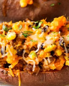Chorizo Enchilada Stuffed Sweet Potatoes | Mexican flavors come together in these stuffed sweet potatoes, for a meal that's healthy and incredibly easy to prep ahead for a stress-free dinner! | http://thechunkychef.com