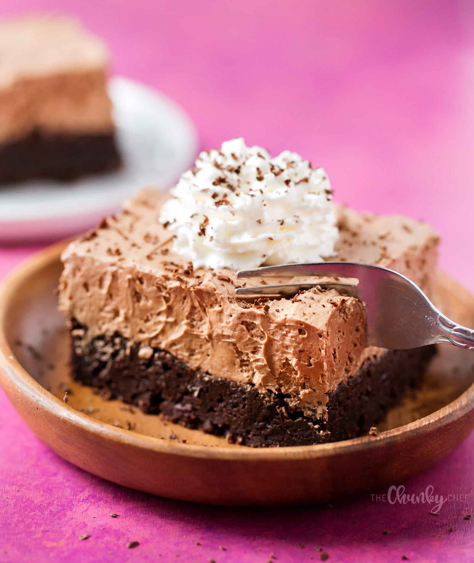 French Silk Pie Brownies | Fudgy brownies topped with a rich French silk pie filling, whipped cream and shaved chocolate... chocolate lovers, this dessert is for you! | http://thechunkychef.com