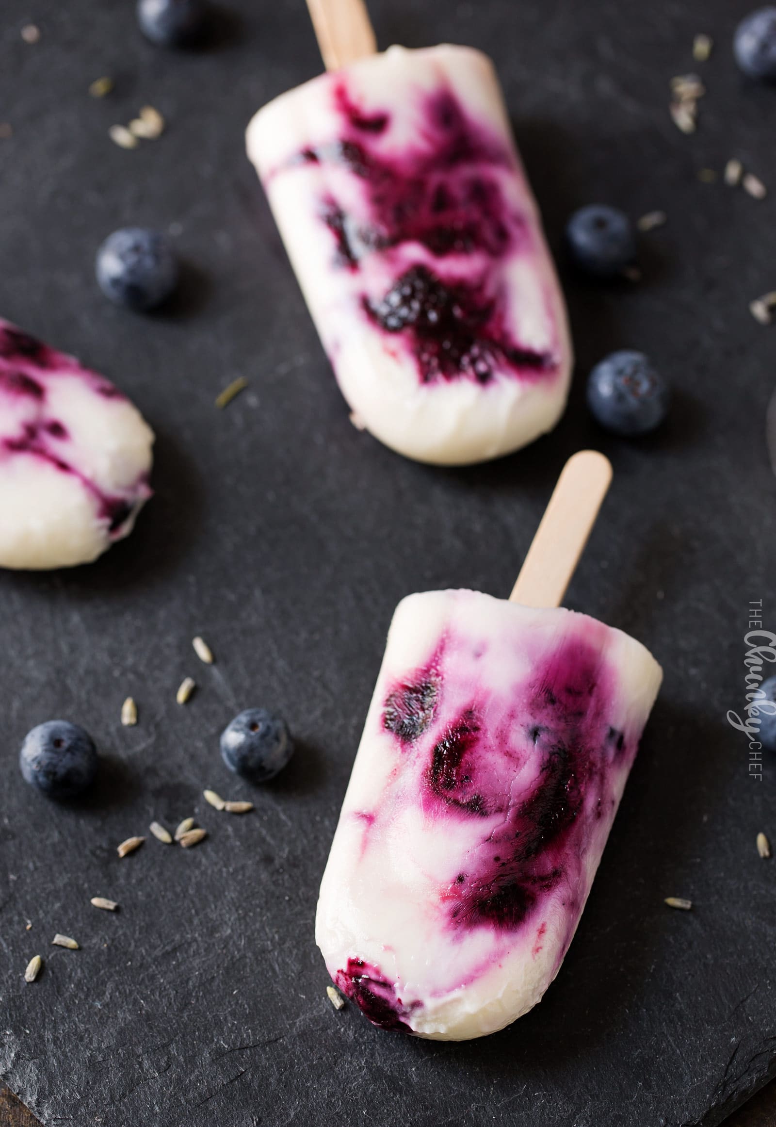 Frozen Blueberry and Lavender Yogurt Pops | An easy homemade yogurt pop made with lavender infused honey, fresh blueberries and creamy yogurt... you'll love this easy frozen dessert! | http://thechunkychef.com