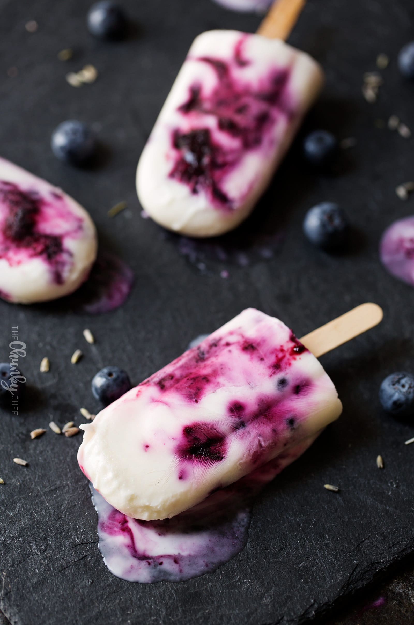 Frozen Blueberry and Lavender Yogurt Pops | An easy homemade yogurt pop made with lavender infused honey, fresh blueberries and creamy yogurt... you'll love this easy frozen dessert! | http://thechunkychef.com