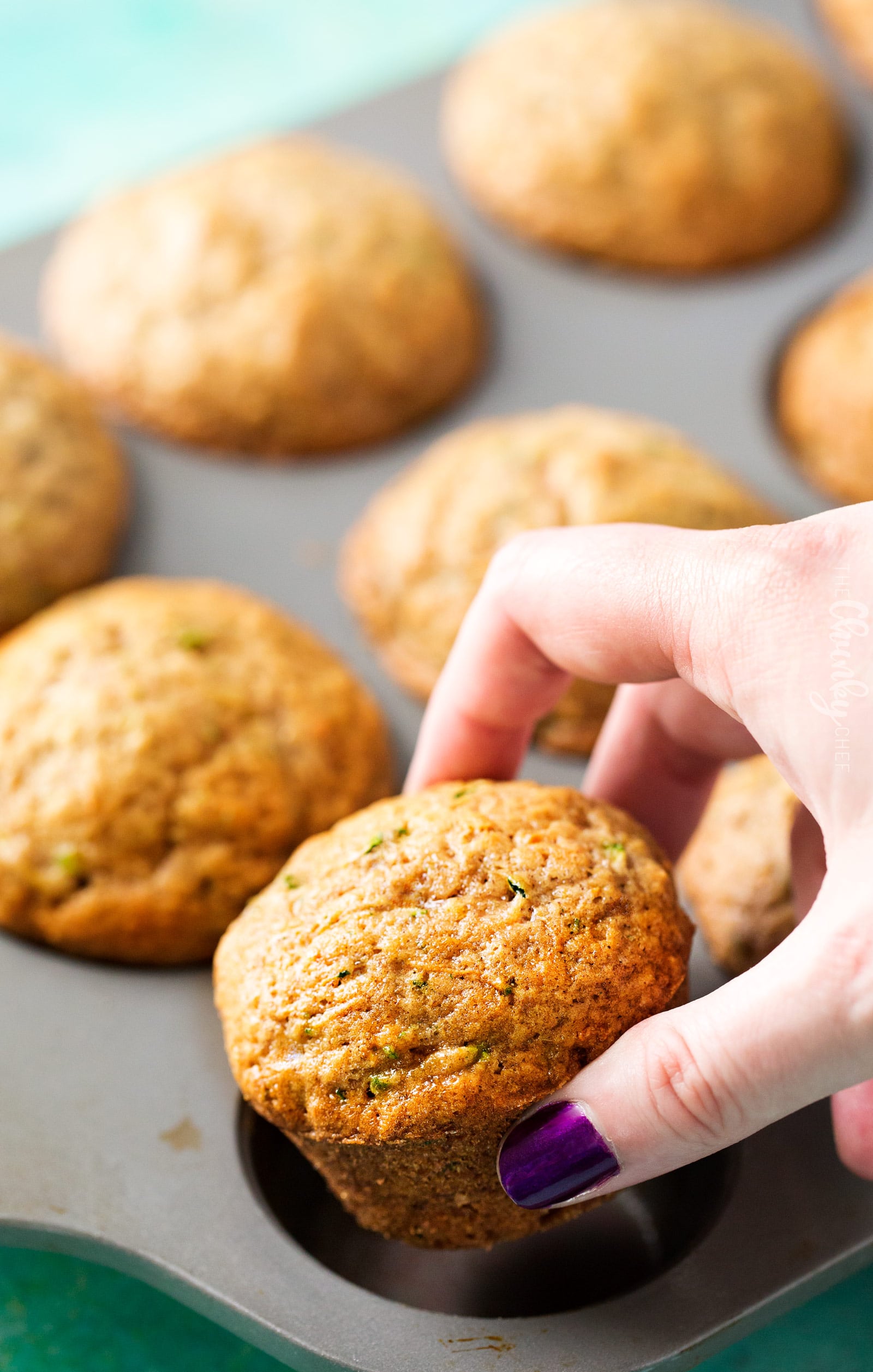 One Bowl Zucchini Muffins | One bowl, no mixer needed, and everyday ingredients... the perfect zucchini muffins! These muffins are perfect for breakfast, a snack, or getting kids to eat extra veggies! | http://thechunkychef.com