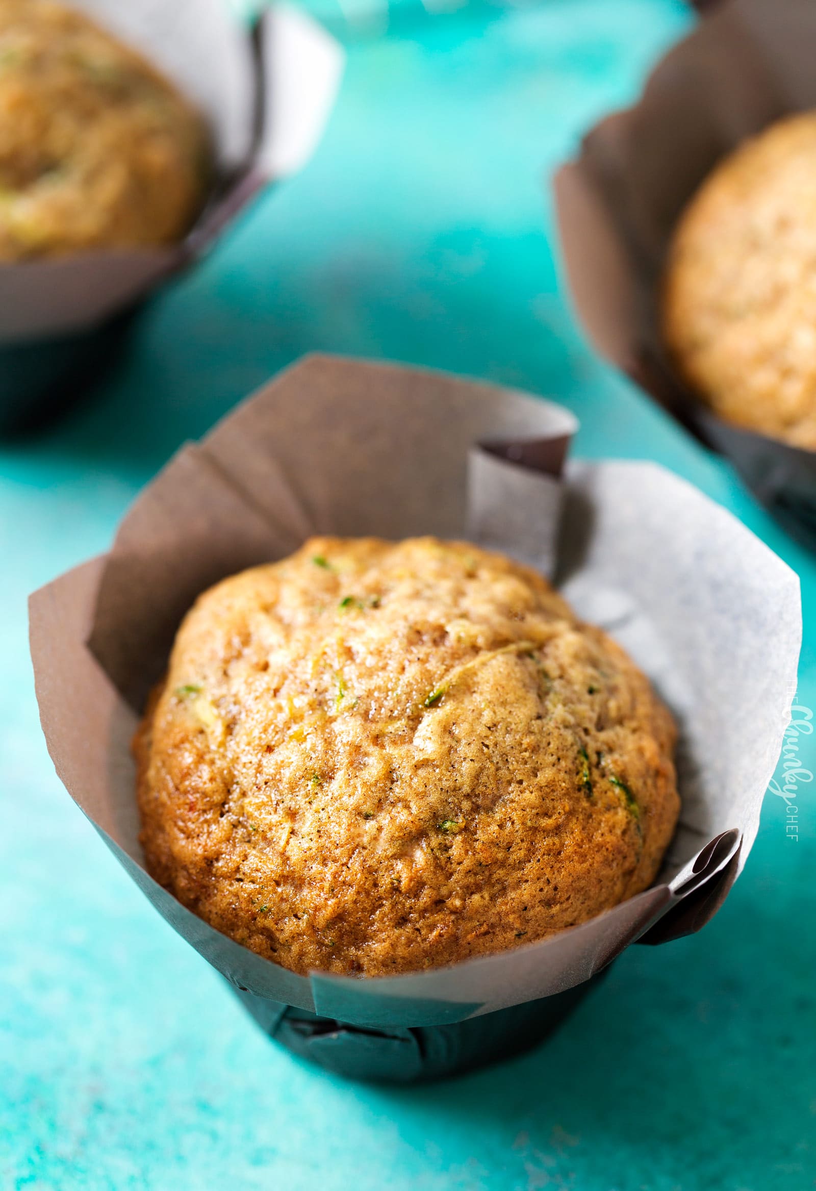 One Bowl Zucchini Muffins | One bowl, no mixer needed, and everyday ingredients... the perfect zucchini muffins! These muffins are perfect for breakfast, a snack, or getting kids to eat extra veggies! | http://thechunkychef.com