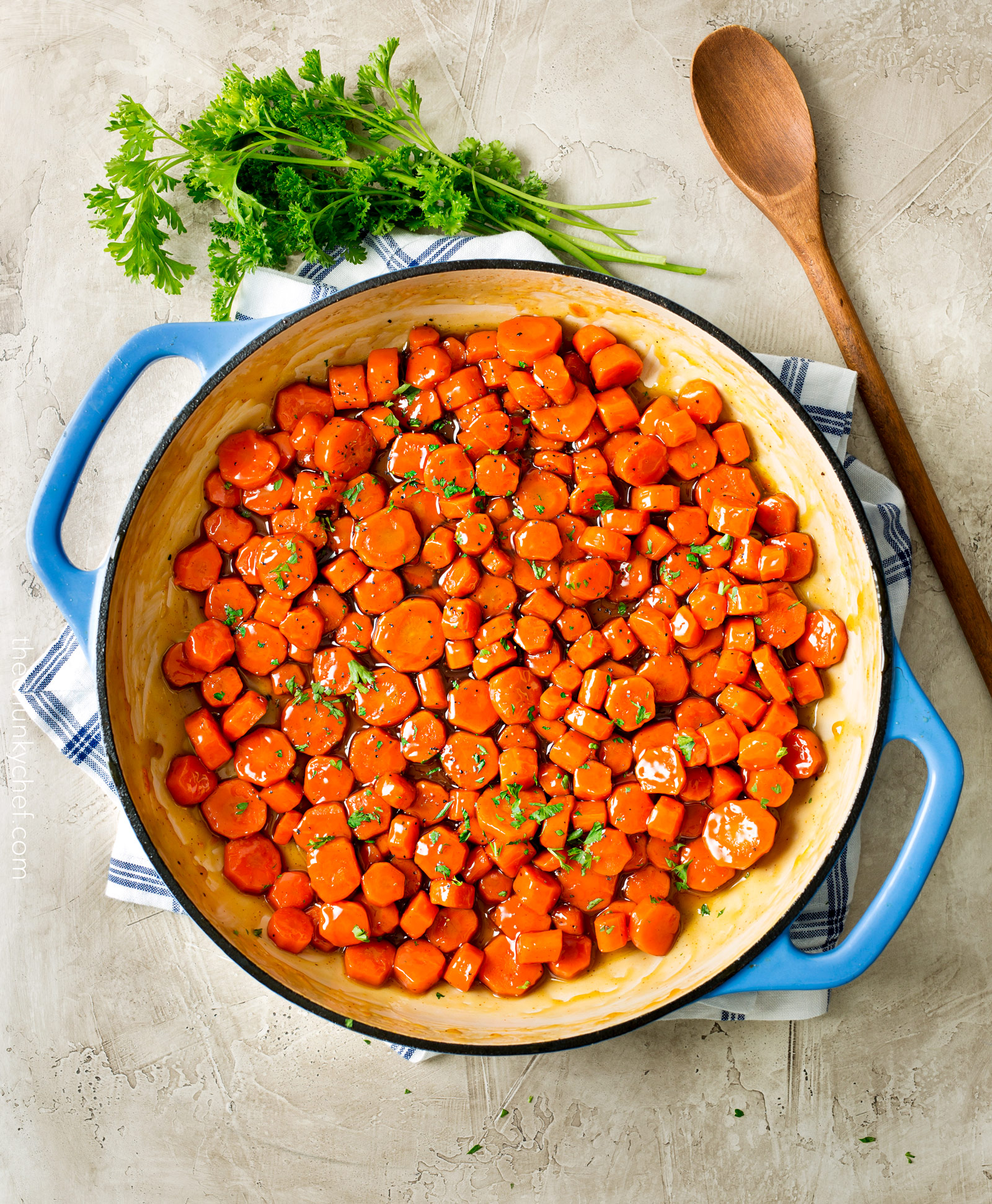 Spicy Bourbon Glazed Carrots | You'll love these easy glazed carrots made with bourbon, brown sugar and cayenne! They're perfect for a weeknight dinner or holiday feast! | http://thechunkychef.com