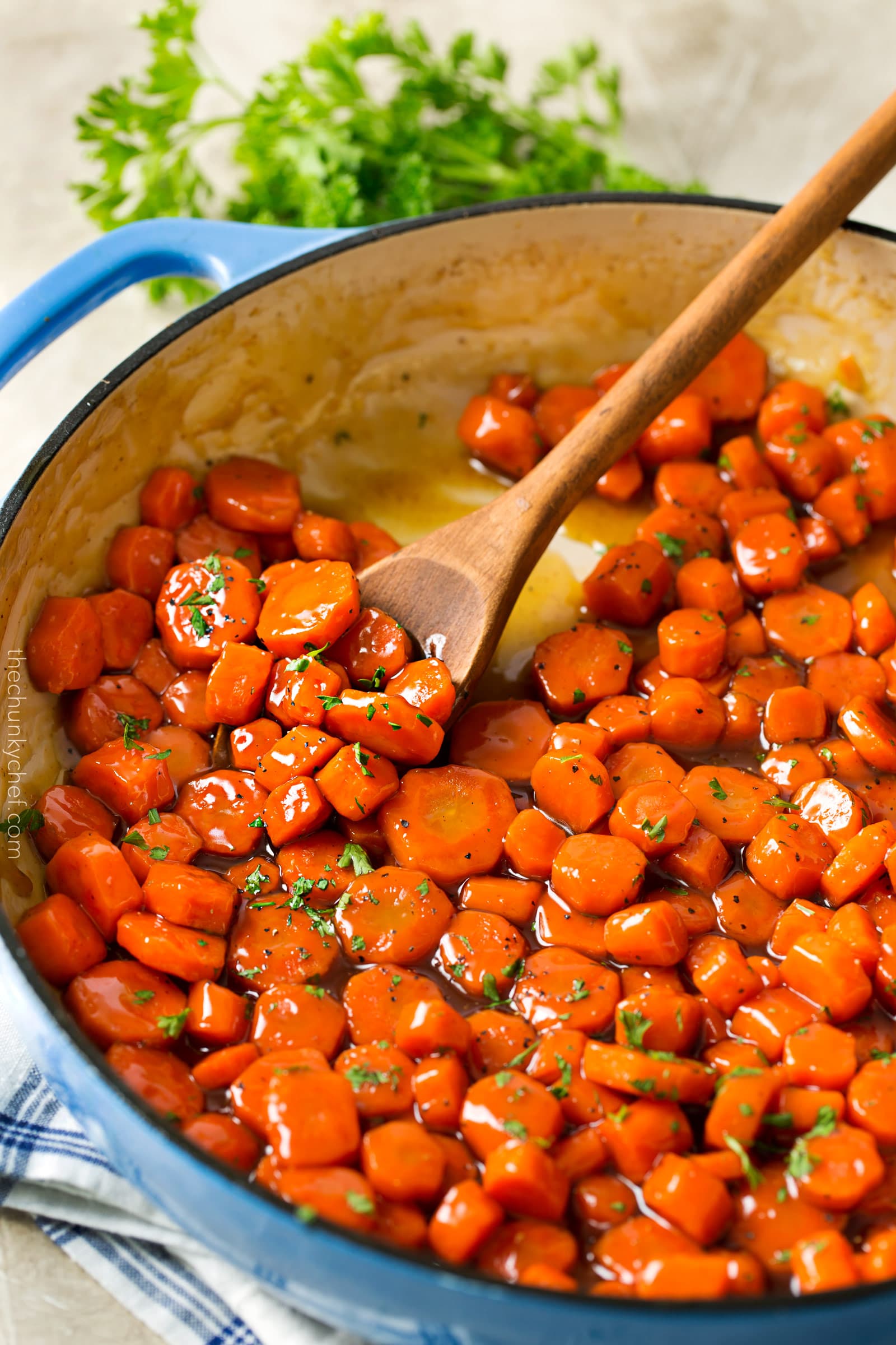 Spicy Bourbon Glazed Carrots | You'll love these easy glazed carrots made with bourbon, brown sugar and cayenne! They're perfect for a weeknight dinner or holiday feast! | http://thechunkychef.com