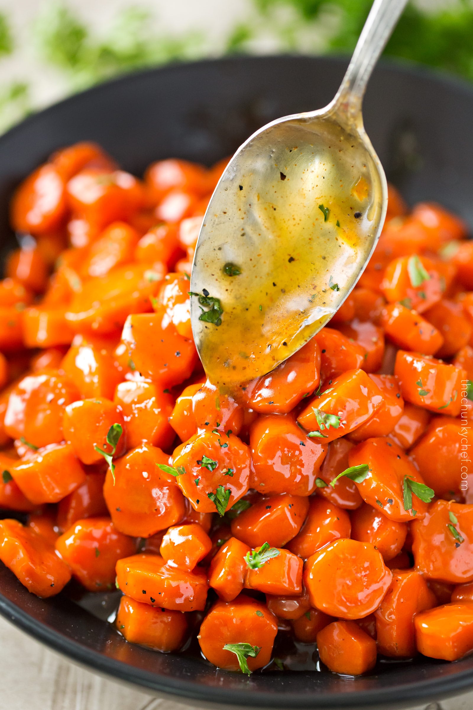 Spicy Bourbon Glazed Carrots | You'll love these easy glazed carrots made with bourbon, brown sugar and cayenne! They're perfect for a weeknight dinner or holiday feast! | http://thechunkychef.com