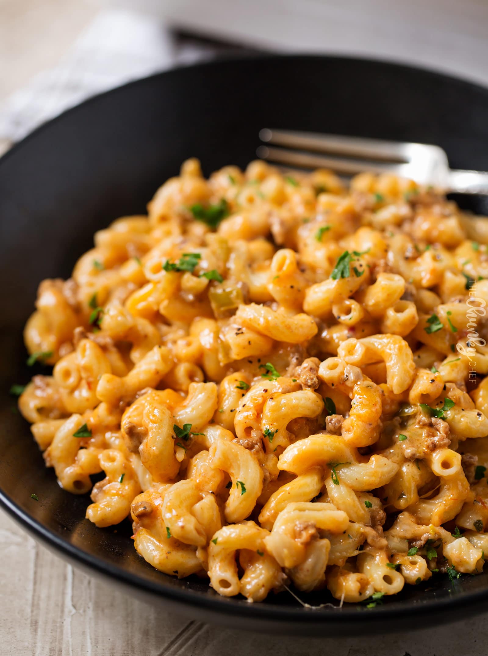 Homemade Chili Mac Bake | Hearty, cheesy, and comfort food the whole family will love!  Perfect for a busy weeknight, and leftovers are just as amazing! | http://thechunkychef.com