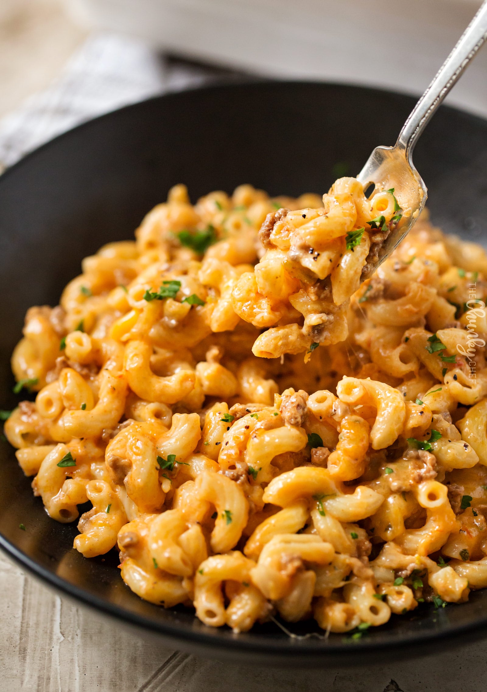 Homemade Chili Mac Bake | Hearty, cheesy, and comfort food the whole family will love!  Perfect for a busy weeknight, and leftovers are just as amazing! | http://thechunkychef.com