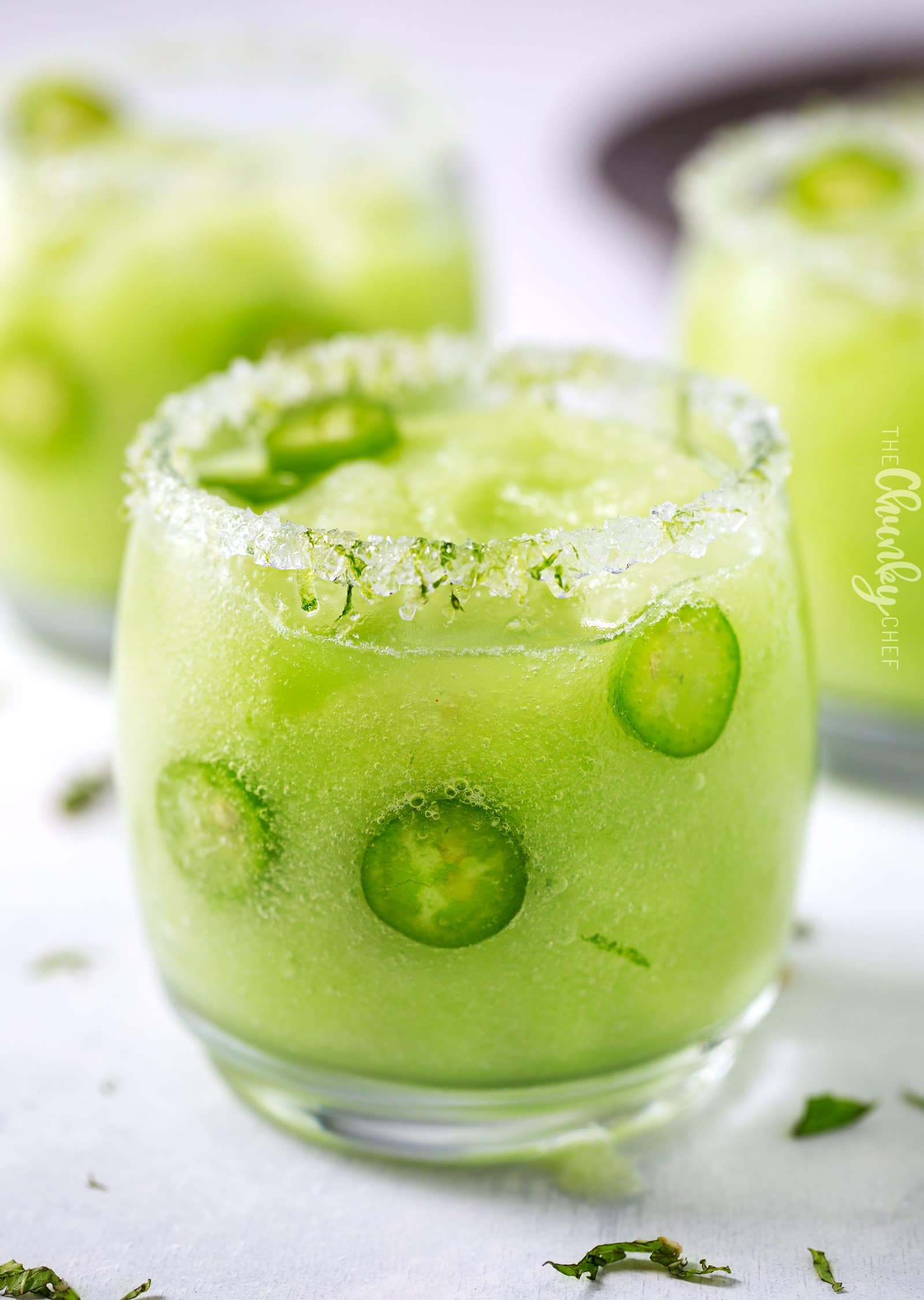 Frozen Honeydew Jalapeno Margarita | Jalapeno infused tequila is blended with fresh honeydew melon and ice to make a beautiful and refreshing summer margarita cocktail! | http://thechunkychef.com