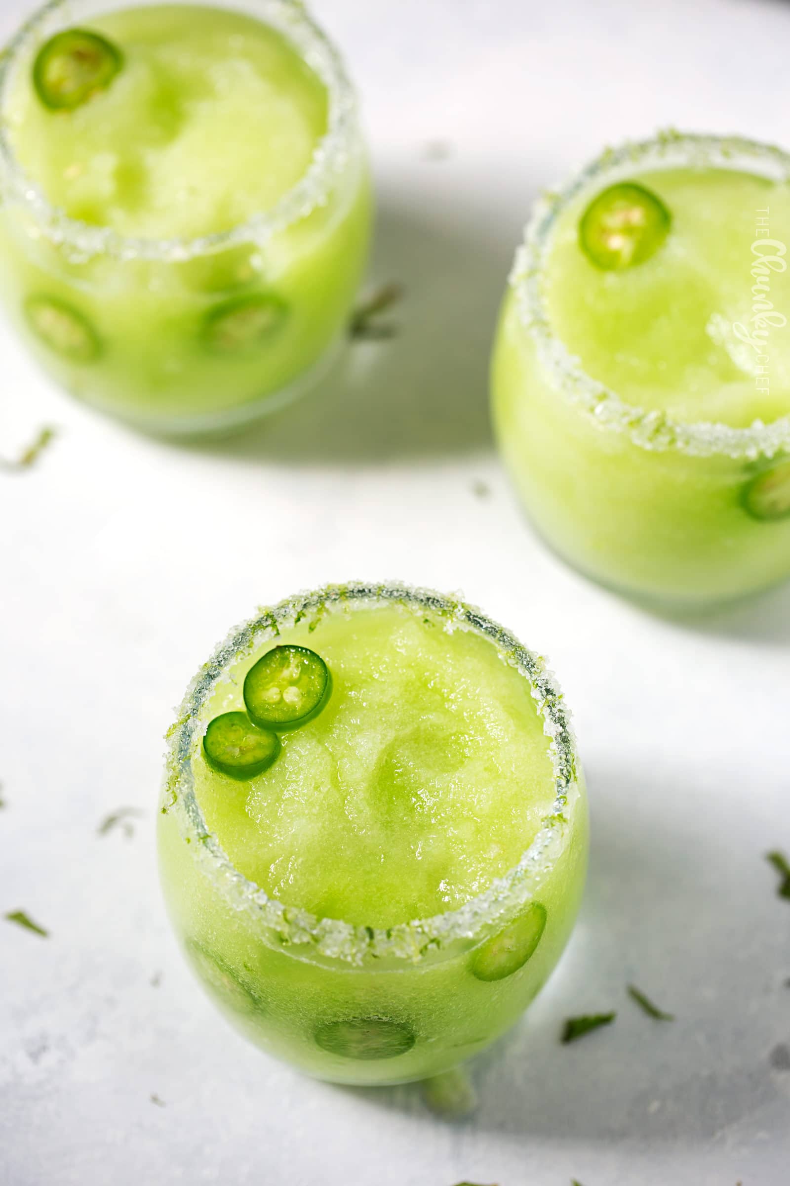 Frozen Honeydew Jalapeno Margarita | Jalapeno infused tequila is blended with fresh honeydew melon and ice to make a beautiful and refreshing summer margarita cocktail! | http://thechunkychef.com