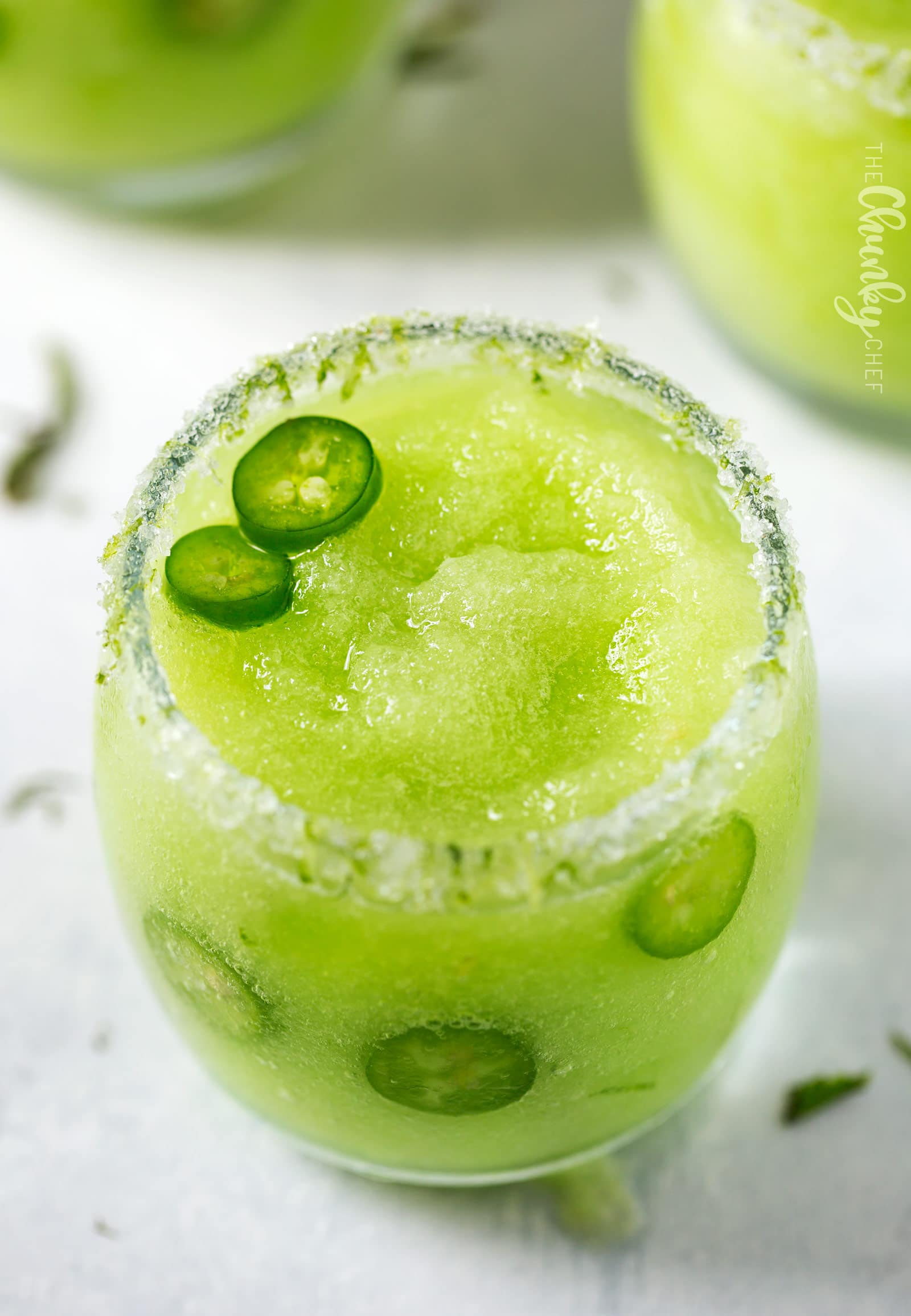 Frozen Honeydew Jalapeno Margarita | Jalapeno infused tequila is blended with fresh honeydew melon and ice to make a beautiful and refreshing summer margarita cocktail! | http://thechunkychef.com