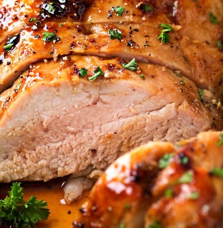 Ginger Honey Roasted Pork Tenderloin | Perfect for a busy weeknight, this pork tenderloin is loaded with amazing flavors and ready in less than 30 minutes! | https://thechunkychef.com | #dinner #pork #roasted #easyrecipe