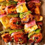 Grilled BBQ Chicken Kabobs | These chicken kabobs are loaded with flavor, from the homemade spice rub, to the perfect bbq sauce they're basted with. Plus, tips for how to skewer bacon, and how to cook these kabobs when grilling isn't an option. | http://thechunkychef.com | chicken | kabob| kebab | skewer | bbq | easy | grilled | summer