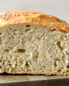 Homemade Artisan No-Knead Bread | Perfectly crusty on the outside, with a soft fluffy inside, this no-knead bread is perfect with any dinner! | https://thechunkychef.com