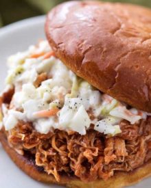 The most incredibly tender pulled pork, made easily in an hour in the Instant Pot! With just 4 ingredients, it's perfect to throw together for dinner with minimal effort! | #pork #pulledpork #bbq #instantpot #pressurecookerrecipes #easyrecipe
