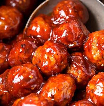 Cranberry BBQ Crockpot Meatballs | The perfect appetizer for a party or game day... with just 3 ingredients and just 5 minutes of prep!  Pop it all in your slow cooker and enjoy! | https://www.thechunkychef.com | #appetizer #meatballs #party #easyrecipe #crockpot #slowcooker