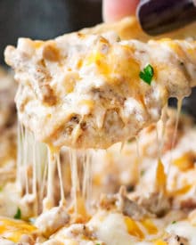 Creamy Skillet Bacon Cheeseburger Dip | Creamy, cheesy, and oh so addicting, this bacon cheeseburger dip is just like your favorite gooey cheeseburger... but in a party-ready dip form! | https://www.thechunkychef.com | #gameday #party #appetizer #dip #cheeseburger