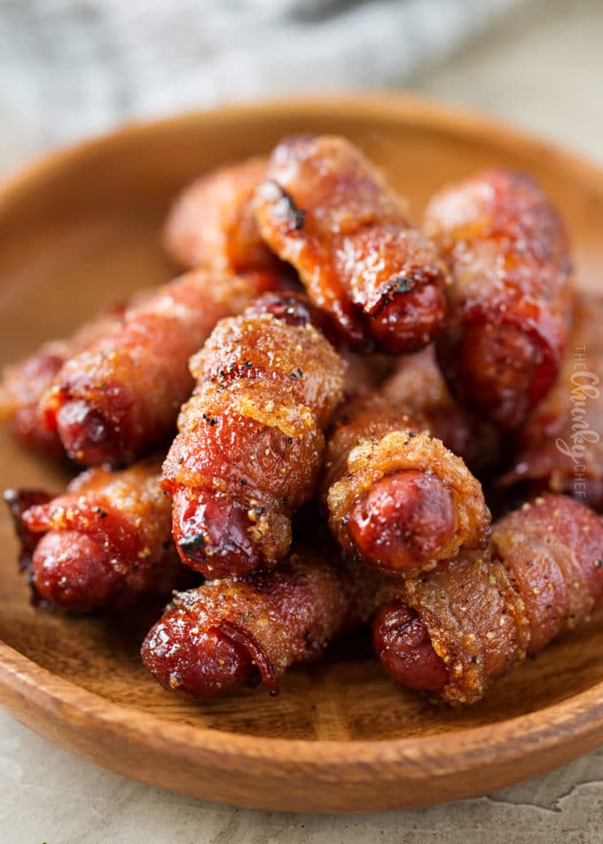 Plate of bacon wrapped little smokies (cocktail sausages)