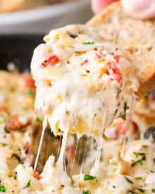 Asiago and Spinach Artichoke Dip | A classic party dish, this baked spinach and artichoke dip is made from scratch, using fresh ingredients, and still super easy to throw together! | https://www.thechunkychef.com | #partydip #hotdip #spinach #gameday #artichokedip
