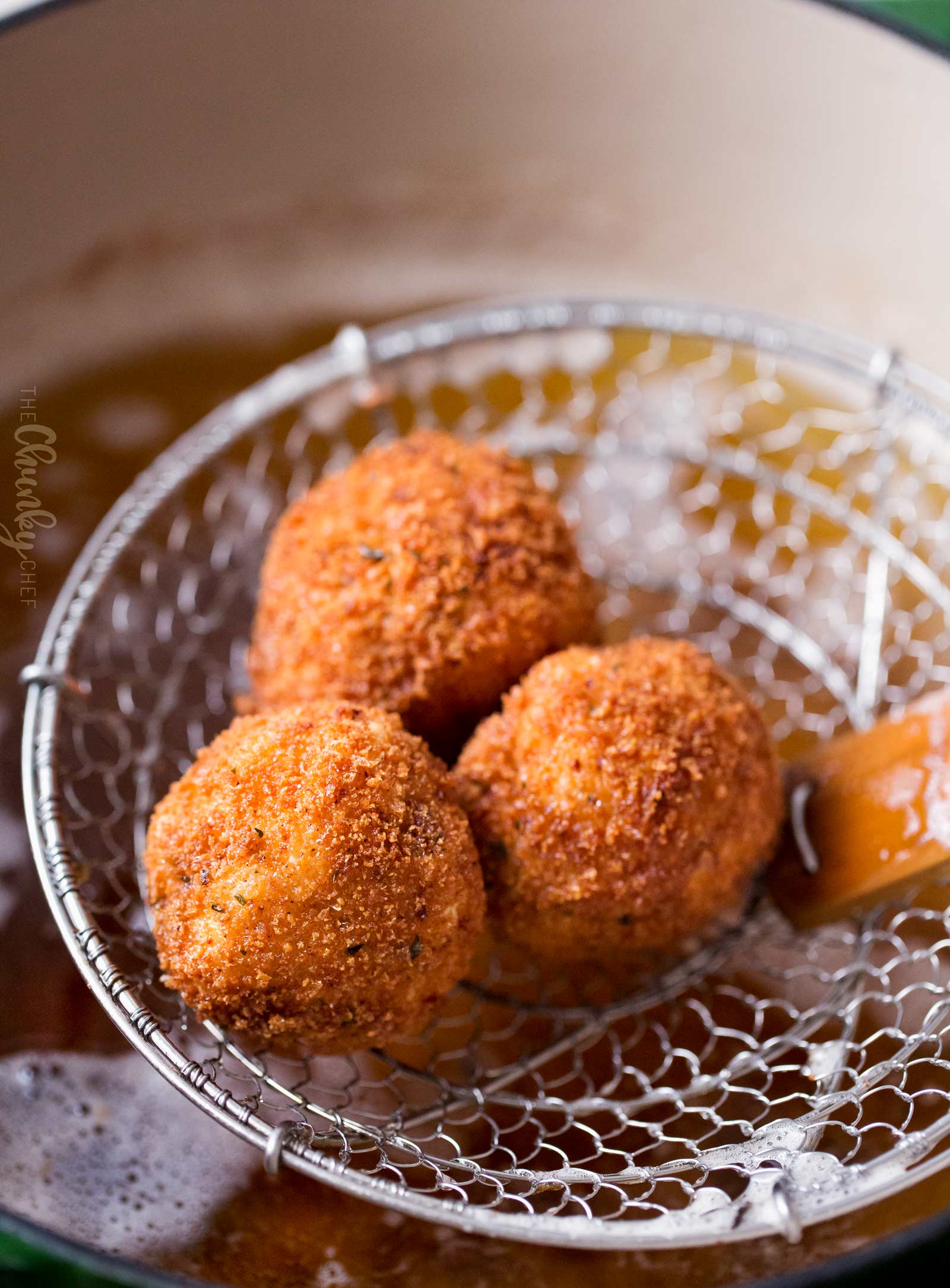 Picture of 3 Mac and cheese bites right out of the fryer