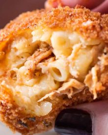 BBQ Pulled Pork Fried Mac and Cheese Bites | 5 cheese homemade Mac and cheese, slow cooker bbq pulled pork, combined and breaded in crispy spiced panko and fried until perfectly golden! | https://thechunkychef.com | #appetizer #gameday #tailgating #friedmacandcheese #pulledpork